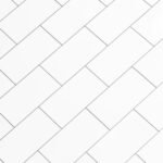 Juntas de azulejos blancas y limpias tras eliminar el moho